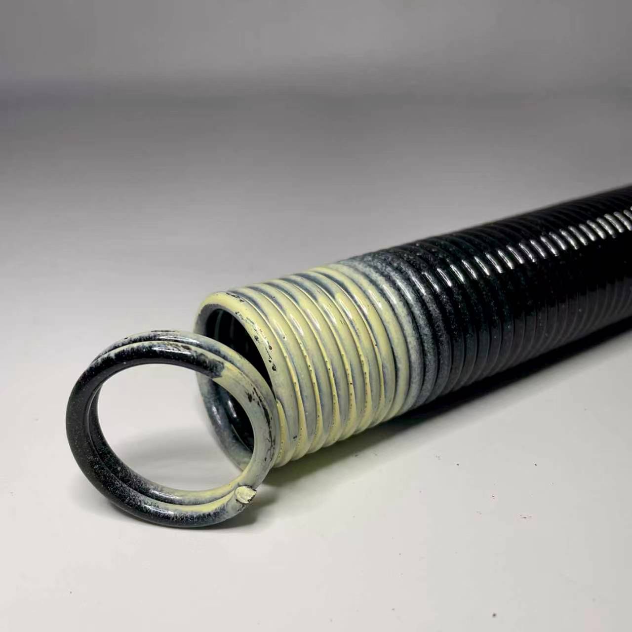 Cream Color-Coded Extension Spring