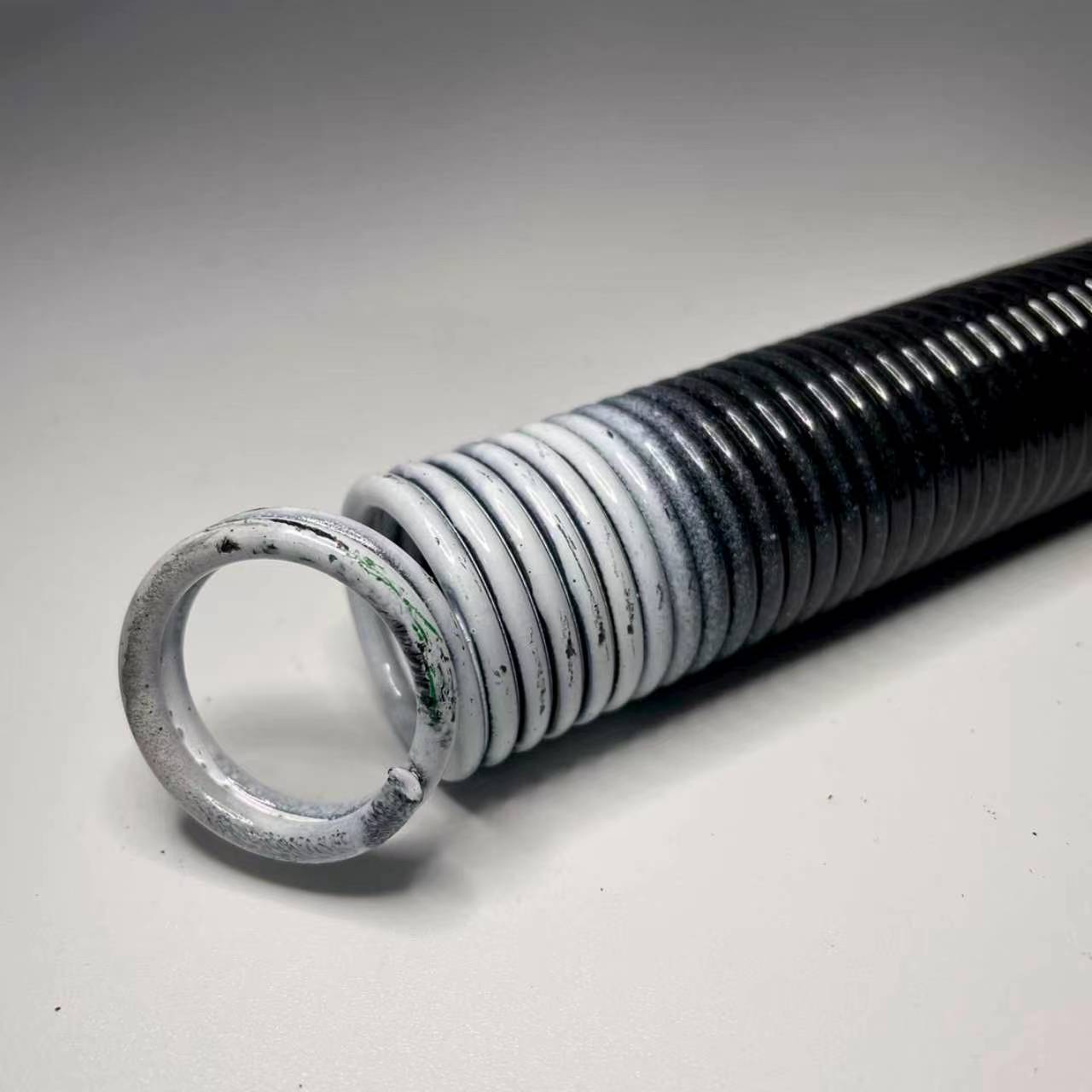 White Color-Coded Extension Spring